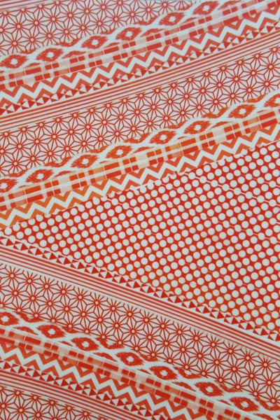postcard-sized artwork of red washi tape