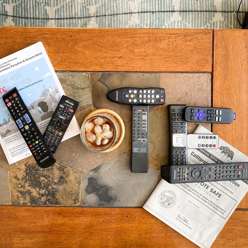 remote controls for TVs arranged to spell vote