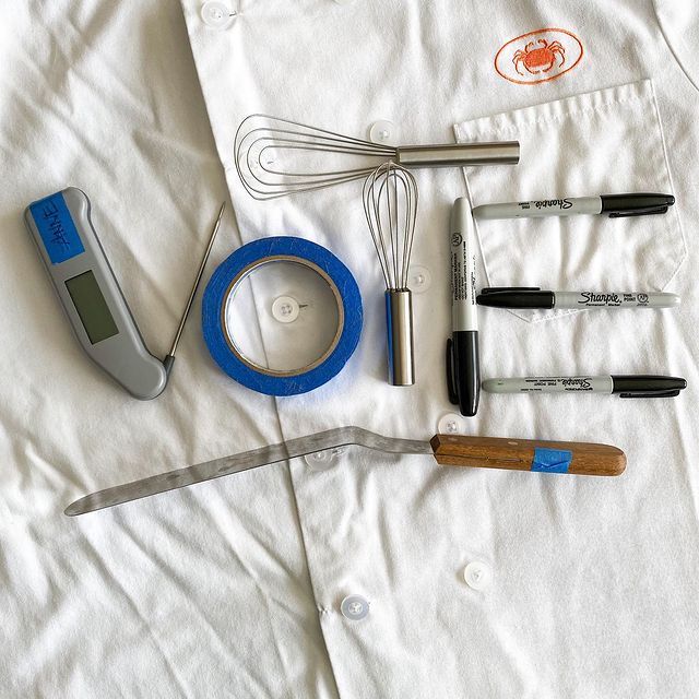 Pastry tools spelling vote on a chef coat