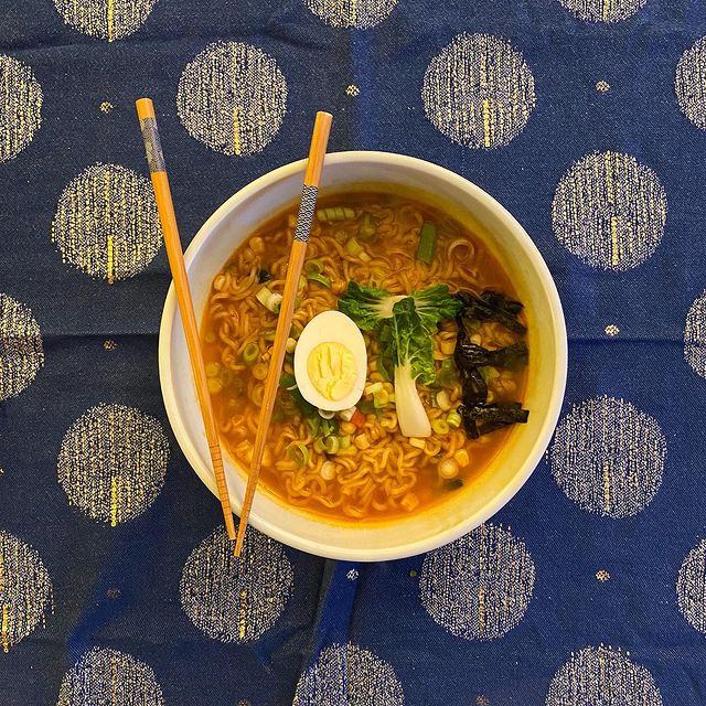 Vote spelled with ramen, chopsticks in the shape of a V