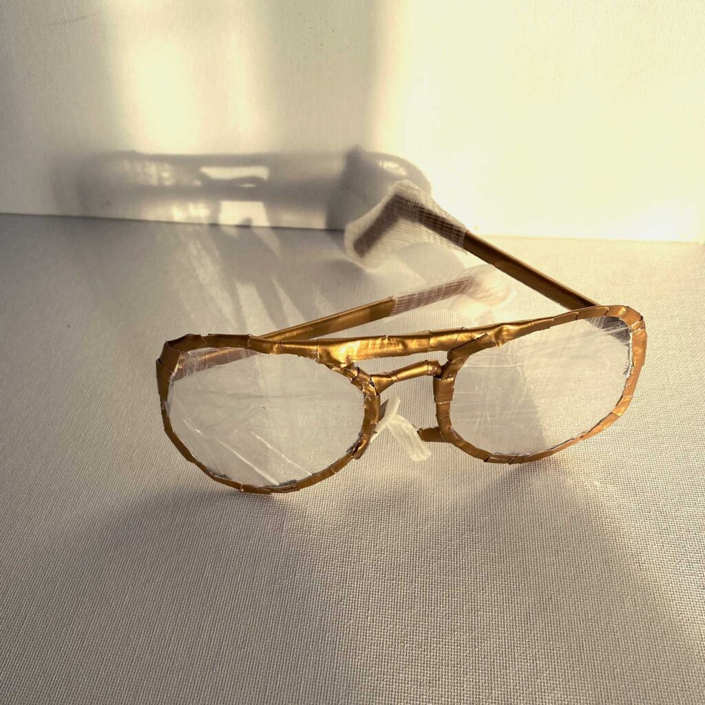 Gold aviator glasses made with duct tape and packing tape, view from angle